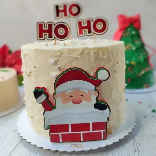pastel de santa decorado con buttercream con motivos de navidad
